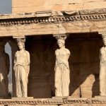 View of the Caryatids on the Erechtheion, Acropolis in Athens under daylight.